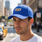 Lifestyle shot of man wearing Cadillac Car Dad Baseball Cap Hat in city street, showing fabric details and natural outdoor lighting.
