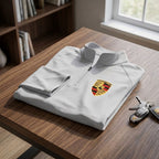 Casual arrangement of men's Porsche athletic shirt on dark wooden table, emphasizing fabric texture, stitching, and everyday versatility.