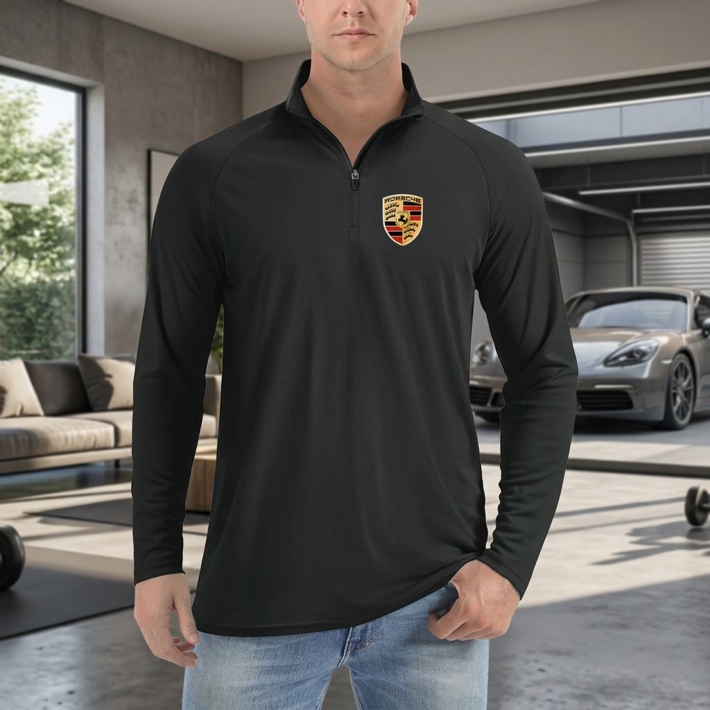 Close-up of men's Porsche lightweight quarter-zip athletic shirt on a sleek hanger, highlighting the moisture-wicking fabric and stitching.