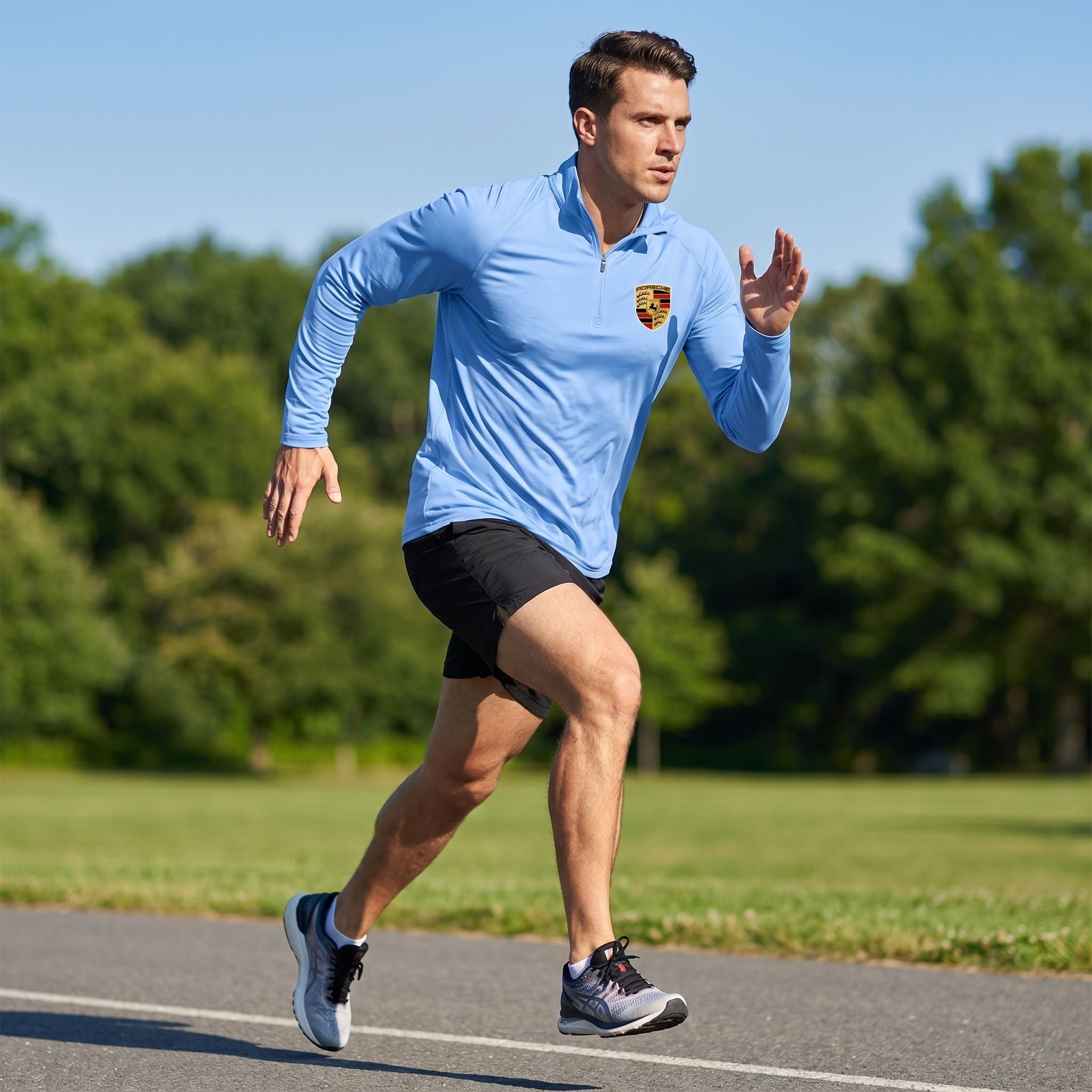 Male athlete wearing Porsche-inspired quarter-zip shirt running outdoors, highlighting athletic fit and stretch fabric.
