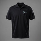 Studio shot of men's Mercedes-Benz polo on a mannequin, showing fabric texture, collar, and button details under neutral lighting.