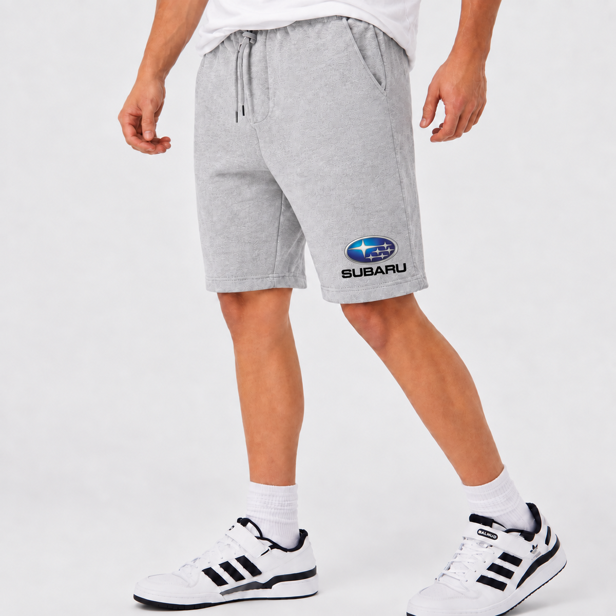 Subaru shorts Gray logo near lower left leg hem