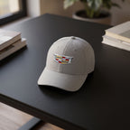 Top-down shot of a small Cadillac Car Dad baseball cap on a matte black table, emphasizing the structured crown and stitching details.